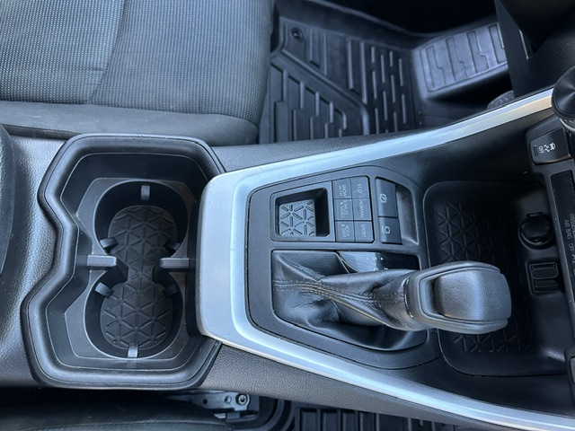 After interior detailing: spotless center console, cup holders and shifter in a Toyota RAV4
