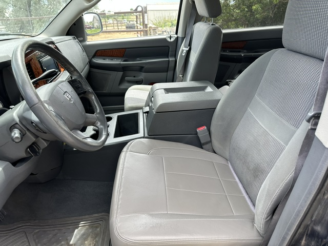 After interior detailing: clean dash, steering wheel, console and front seats in a Dodge Durango