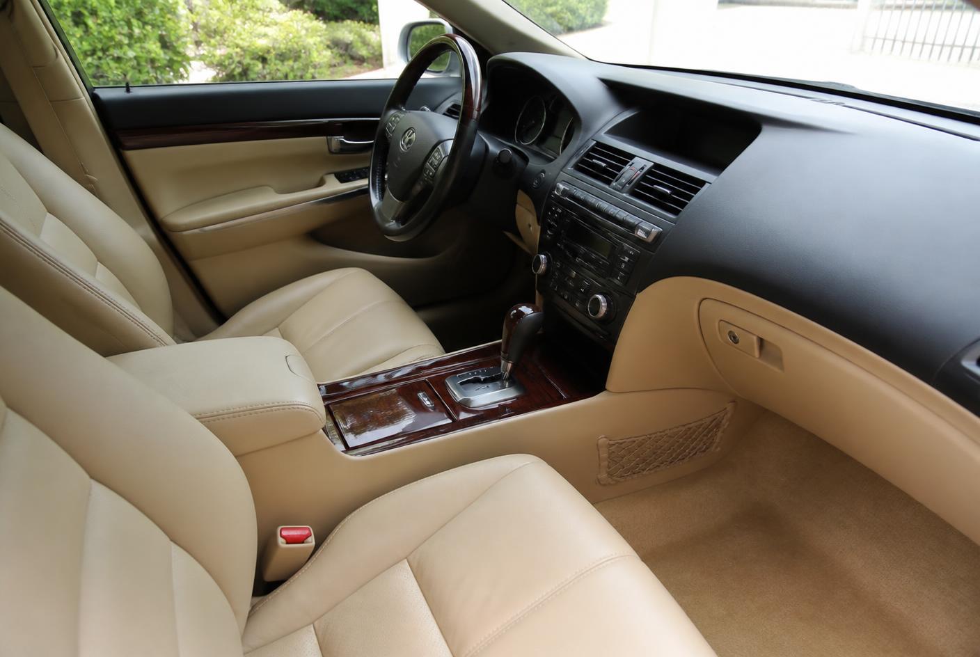 Spotless car interior with clean leather seats and dashboard after detailing